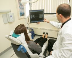 Dr. James Dores with X-ray | Dores Dental in East Longmeadow, MA Dr. James Dores with X-ray | Dores Dental in East Longmeadow, MA