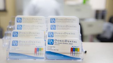 Take one of our Business Cards at Dores Dental in East Longmeadow, MA